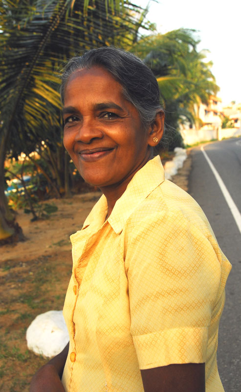Indrani works at a tourist hotel and as her smile says she likes it. Unawatune, Sri Lanka. 4 Feb. 2010.Photograph© Chulie de Silva