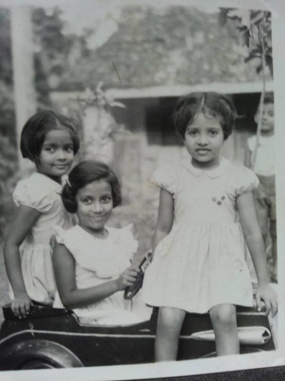 Anoma in centre sits in a her toy pedal car with my sister on left and am on the right. Photo Dr. Richie Kirtisinghe.